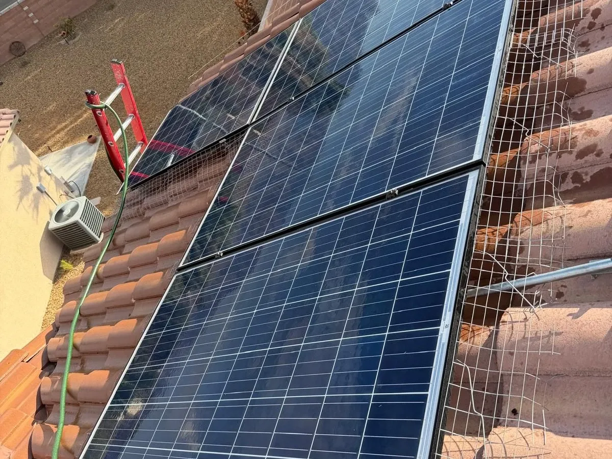Bird mesh clipped around a solar array on a Las Vegas tile roof